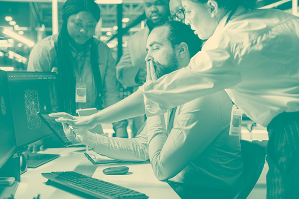 Team of admins working together in server hub, analyzing rigs data. Data center office IT professionals doing brainstorming, examining supercomputers gear, ensuring system integrity and security